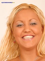 Busty mature blonde spreads her bubble-like buns