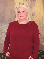 Horny grandma munching on two plump dicks