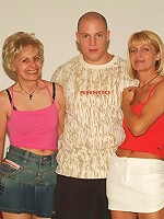 Experienced mature women Ritta and Rosalie take equal turns in riding a young cock