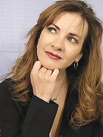 Small tits matured brunette strips off for the camera while posing