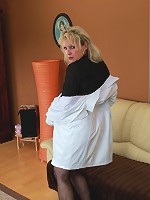 Horny blonde housewife getting naughty on the couch