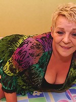 Horny mature slut playing with her big toy