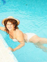 This big housewife gets naughty at the pool