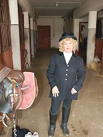 Mature slut playing with herself in a barn