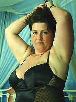 Big titted mama playing with her pussy