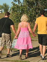 Mature slut fucking two dudes in the woods