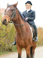 This horny mama gets nasty in the stable