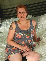 Naughty housewife playing with her pussy