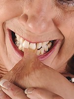 Horny mature slut pleasing her wet pussy