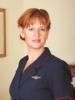 MILF flight attendant Liddy strips off her uniform and spreads in here