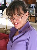 Hairy and petite Lacy from AllOver30 tugs at her mature pussy hair