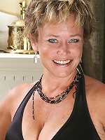 Mature and elegant Ariel strips off her black evening gown