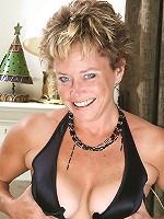 Mature and elegant Ariel strips off her black evening gown