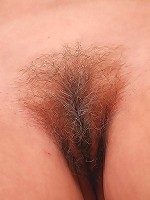 Lili shows off her furry 56 year old pussy and ass for the camera