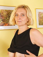 All natural blonde Hillary spreading her 51 year old hairy pussy wide