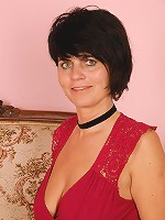 Horny 56 year old Eve displaying a perfect pair of mature titties here
