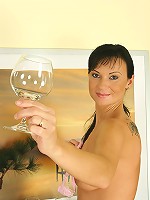 Gorgeous brunette MILF spreads her legs just for you guys