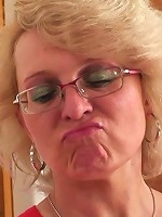 Sultry mature blonde in sexy glasses receives a big cock in her wet box and loves it