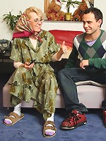 Granny on her hands and knees shakes her ass and he fucks her from behind with long strokes