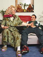 Granny on her hands and knees shakes her ass and he fucks her from behind with long strokes