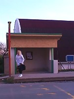 The mature blonde makes a call from his place and her big ass looks damn fine in the scene