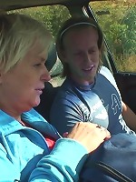 Sexy granny seductress convinces the young man to pull the car over and fuck her pussy