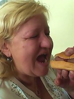 The chubby mature whore is in his bed and she wants to take his cock in her old hole