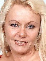 Big older woman pleasures her pussy