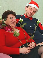 Busty old woman welcomes two cocks in all positions